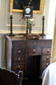 Kneehole desk supporting shaving mirror & candlesticks at Traquair House. Scotland.