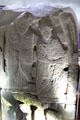 Pictish carved stone with saints in conversation while seated on bench at St Vigeans Museum. Arbroath, Scotland.