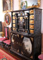 Carved & painted chest with carved woman holding thistle in great hall at Glamis Castle. Angus, Scotland.