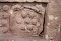 Pictish graveslab detail of 7 bosses circled by serpents at Meigle Sculptured Stone Museum. Meigle, Scotland.