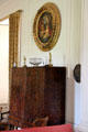 Dutch 18th C cabinet under religious painting in drawing room at Kellie Castle. Pittenweem, Scotland.