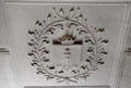 Heraldic panel framed by laurel leaves commemorates marriage of 3red Earl of Kellie to Mary Dalzell in 1676 on ceiling in drawing room at Kellie Castle. Pittenweem, Scotland.