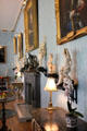 Dining room collection of ivory statuettes along wall at Scone Palace. Perth, Scotland.