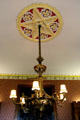 Chandelier under ceiling molding in library at Scone Palace. Perth, Scotland.