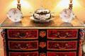 Inlaid chest of drawers with porcelain pieces in Ambassador's room at Scone Palace. Perth, Scotland.