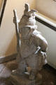 Sculpted armoured soldier with long gun at Fyvie Castle. Turriff, Scotland.