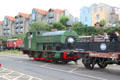 Bristol Harbour Railway steam locomotive pulling passenger car. Bristol, England.