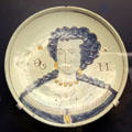 Ceramic plate depicting Queen Mary II who was often depicted together with King William III, made in Brislington,at Bristol Museum & Art Gallery. Bristol, England.
