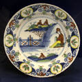 Ceramic plate with Chinese style pattern by Josiah Bundy, Limekiln Lane Bristol at Bristol Museum & Art Gallery. Bristol, England.