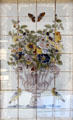 Tile plaque showing floral bouquet made in Bristol at Bristol Museum & Art Gallery. Bristol, England.