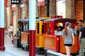 Small gauge train in shopping center adjacent to STEAM Museum of Great Western Railway. Swindon, England.