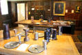 Antique pewter decorative arts, eating utensils and tankards such as might have been used at a 17thC inn at Broadway Museum & Art Gallery. Broadway, England.