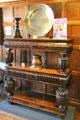 English joined three-tier oak cupboard with shelf supports in form of urns at Broadway Museum & Art Gallery. Broadway, England.