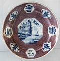 Bristol Plate with center design of ship sailing by rocky shore at Broadway Museum & Art Gallery. Broadway, England.