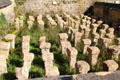 Limestone pillars of hypocaust, underfloor heating system, at Chedworth Roman Villa. England