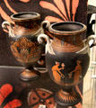 Black Basalt vases with swan handles & encaustic enamel by Wedgwood at World of Wedgwood. Barlaston, Stoke, England