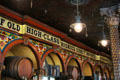 Decoration & light fixtures over bar at Crown Liquor Saloon. Belfast, Northern Ireland.