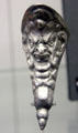 Silver jug spout with face of Bacchus from wreck of Spanish Armada ship off coast of Ireland at Ulster Museum. Belfast, Northern Ireland.