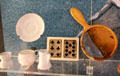 Vessels, playing cards & mirror salvaged from wreck of Titanic at Ulster Transport Museum. Belfast, Northern Ireland.