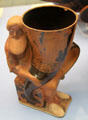 Terracotta red figure rhyton in form of Dionysus holding drinking cup made in Athens at British Museum. London, United Kingdom.