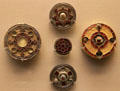 Celtic silver disk brooches from Kent at British Museum. London, United Kingdom.