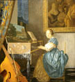 Young Woman seated at a Virginal painting by Johannes Vermeer at National Gallery. London, United Kingdom