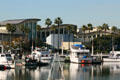 Aquarium of the Pacific over small craft marina. Long Beach, CA.