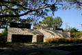 Rough stone house under Merton Bay Fig tree. Santa Monica, CA.
