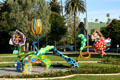 Sculpture of fanciful flowers in Beverly Gardens Park on Santa Monica Blvd. Beverly Hills, CA.