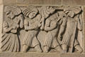 Natives with stringed instruments relief on Gwynn Wilson Student Union at USC. Los Angeles, CA.