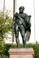 Bronze sculpture of Roman wearing lion skin carrying child at Henry E. Huntington Library. San Marino, CA.