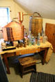 Copper still & bottles at Davis House Museum. San Diego, CA.