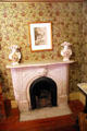 Bedroom fireplace at Davis House Museum. San Diego, CA.