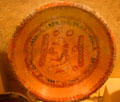 Mayan pottery three-legged plate with seated man prob. from Campeche, Mexico at San Diego Museum of Man. San Diego, CA.