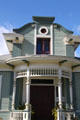 Victorian front porch of Historical Glass Museum. Redlands, CA.