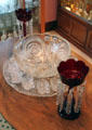 Glass punch bowl & lusters at Historical Glass Museum. Redlands, CA.