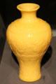 Yellow glass vase as lotus pond from China at Asian Art Museum. San Francisco, CA.