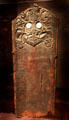 Carved woman's work board from Kalimantan Indonesia at de Young Museum. San Francisco, CA.