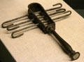 Bronze sistrum from Rome played by women in Egyptian temples at Rosicrucian Egyptian Museum. San Jose, CA.