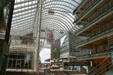 Arcade of Denver Performing Arts Complex with entrance of Boettcher Concert Hall & Infinite Energy sculpture. Denver, CO.
