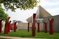 Wheel by Edgar Heap of Birds inscribed "Nah Kev Ho Eya Zim" inspired by native medicine wheel at Denver Art Museum. Denver, CO.