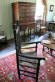 Armchair, with high chest beyond at Hyland House. Guilford, CT.