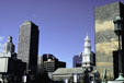 Gold One Financial Plaza towers over First Church of Christ. Hartford, CT.