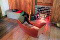 Cradle before fireplace at Stanley-Whitman House. Farmington, CT.