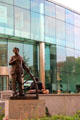 Statue of Mark Twain with Riverboat wheel at Hartford Public Library. Hartford, CT.