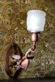 Bird fighting snake light fixture at Butler-McCook House Museum. Hartford, CT.
