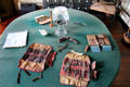 Table with early medical instruments & bowl of leeches at Dr. Hezekiah Chaffee House. Windsor, CT