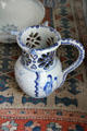 Blue decorated puzzle jug with English rhyme at Phelps-Hathaway House. Suffield, CT.