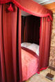 George Washington's bedroom with original wallpaper & calamanco-style quilt at Joseph Webb House. Wethersfield, CT.