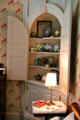 Corner cupboard in Miss Florence's bedroom at Florence Griswold Museum. Old Lyme, CT.